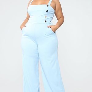 Wide Leg open back romper. Brand new!